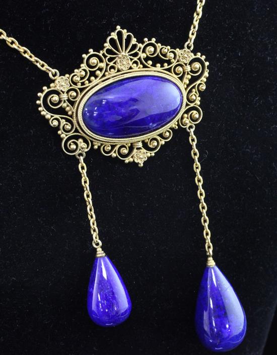 A 20th century high carat gold and lapis lazuli necklace, motif inc. drops 3.25in.